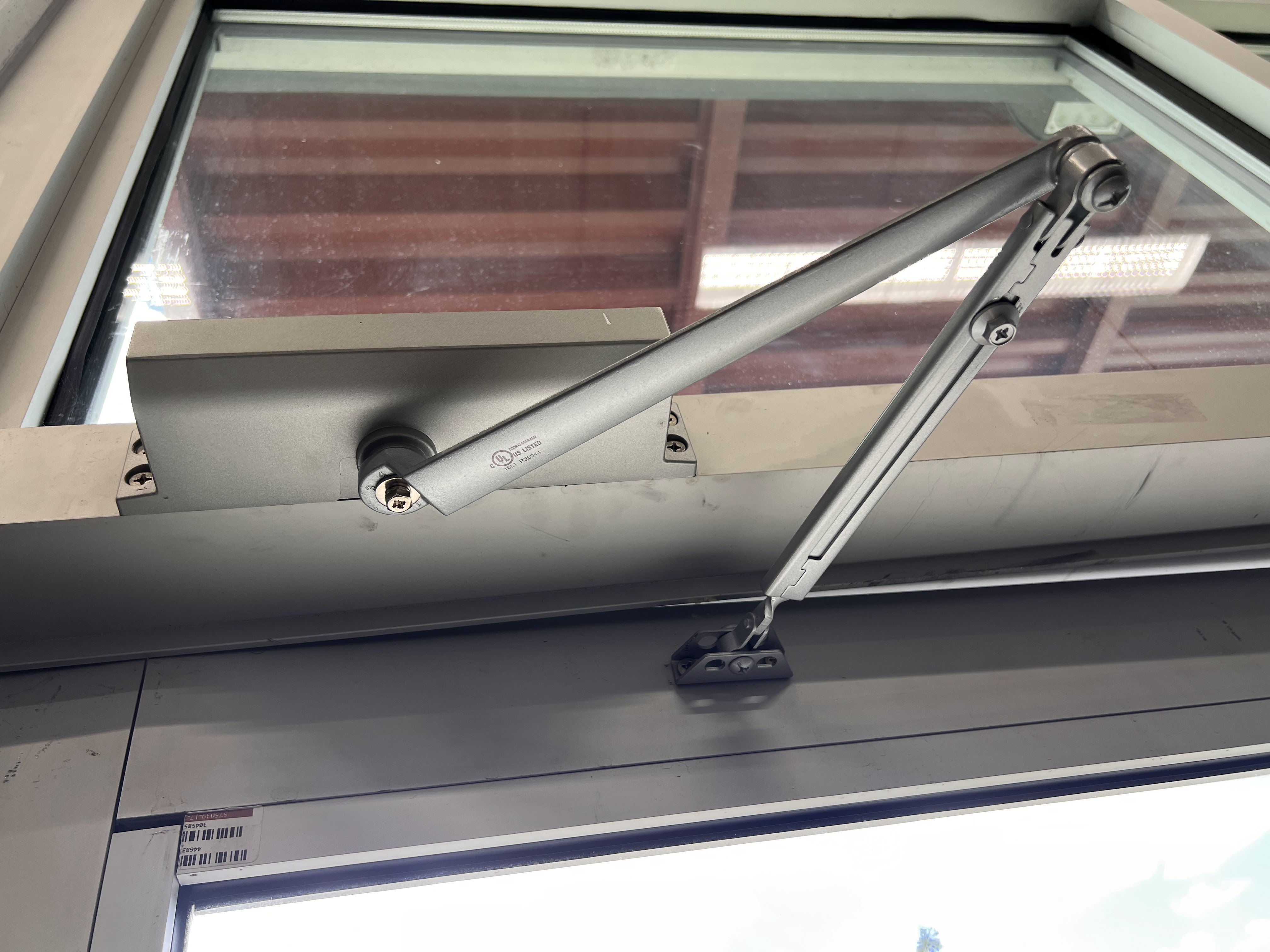 Door closer installation - Home Security Assessment - Premier Locksmith Delray Beach